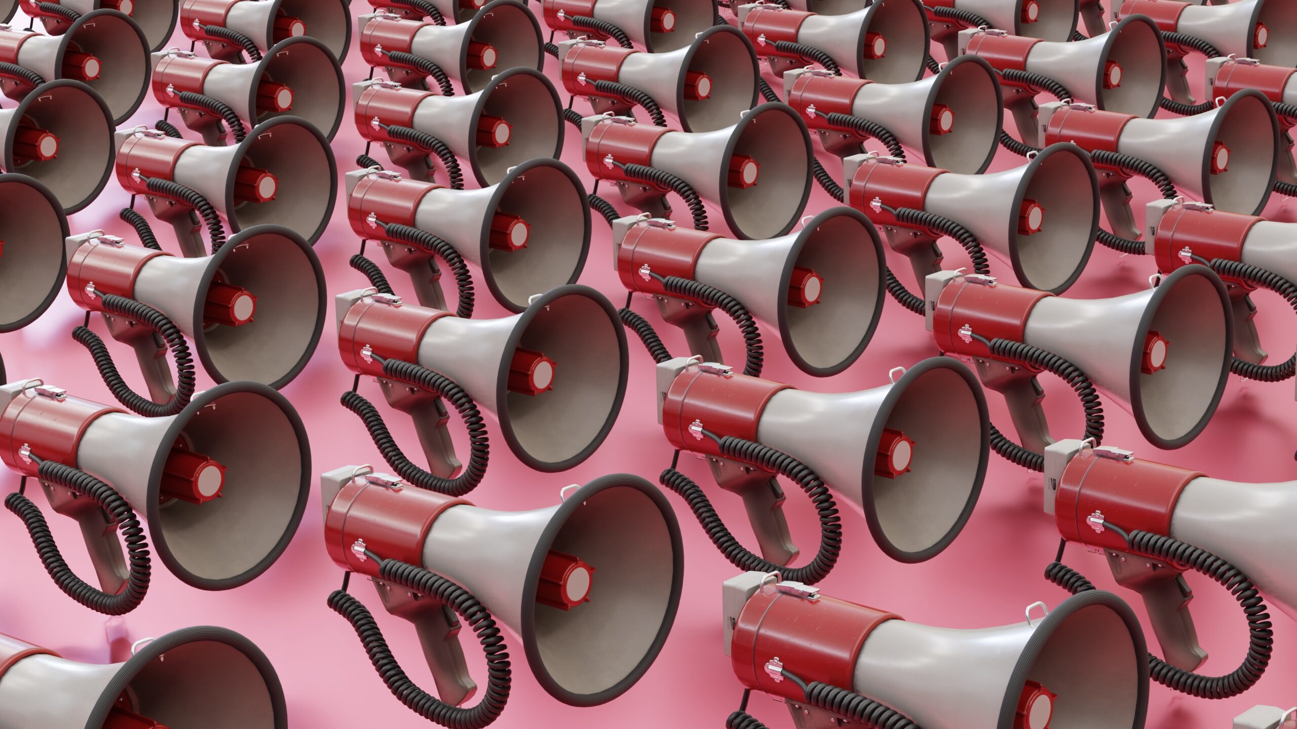 Tons of megaphones on a pink background